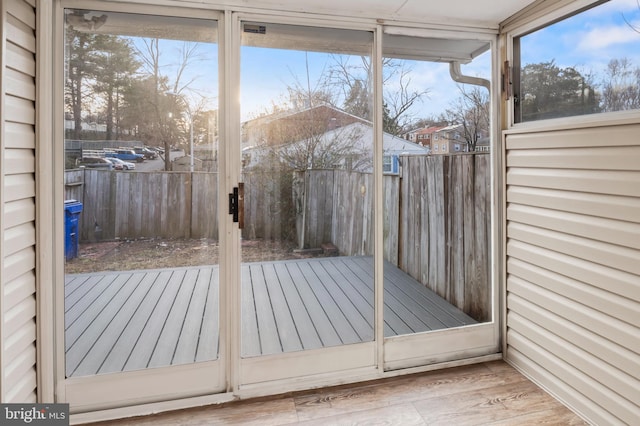 doorway to outside with light hardwood / wood-style flooring