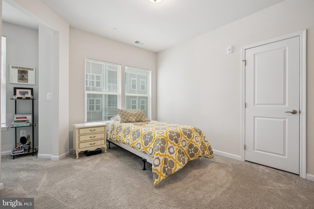 bedroom featuring carpet