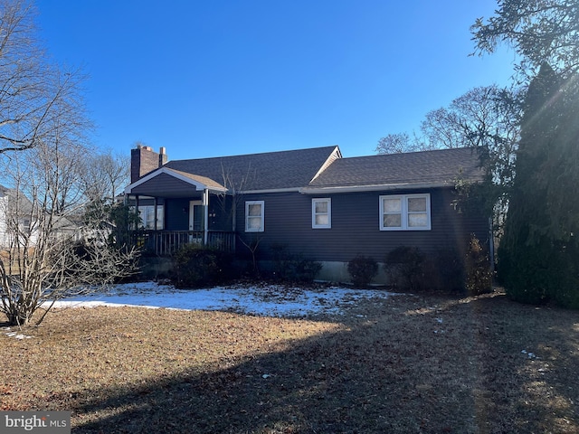 single story home featuring a porch