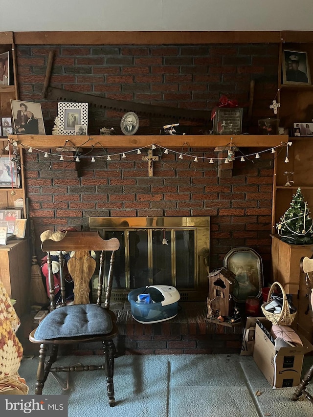 room details with a brick fireplace and carpet floors