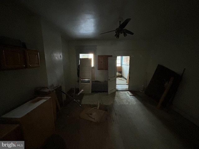 interior space featuring ceiling fan