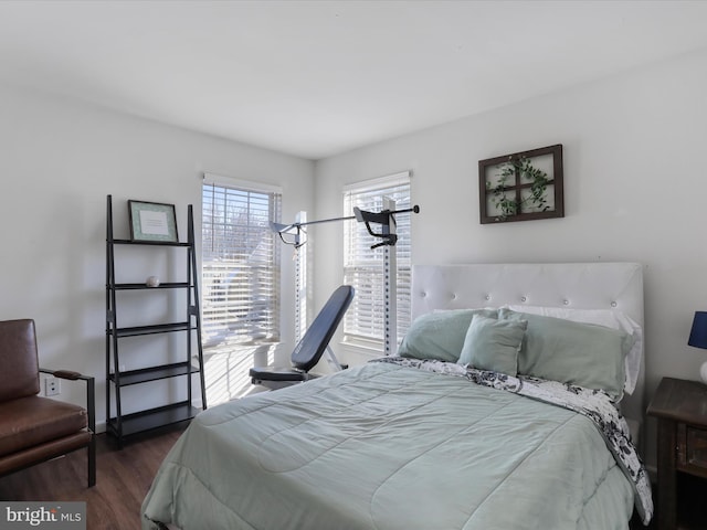 bedroom featuring dark hardwood / wood-style floors