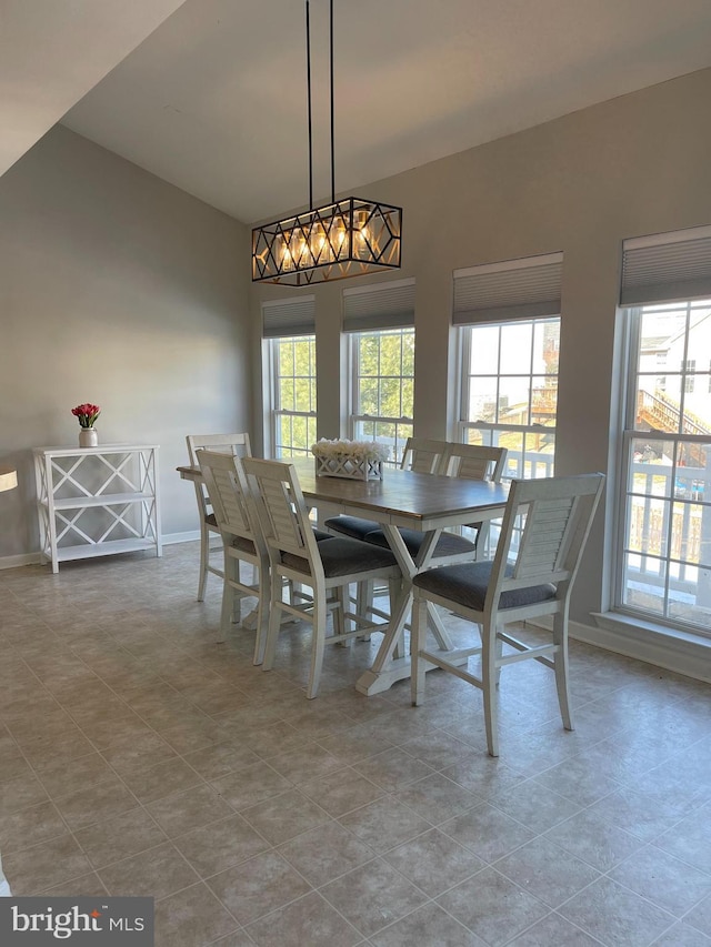 dining area with light tile patterned floors