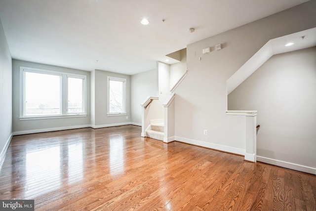 bonus room featuring light wood-type flooring