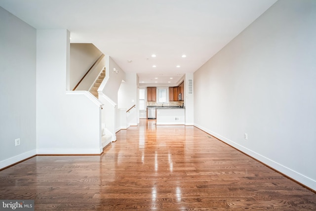 unfurnished living room featuring light hardwood / wood-style floors