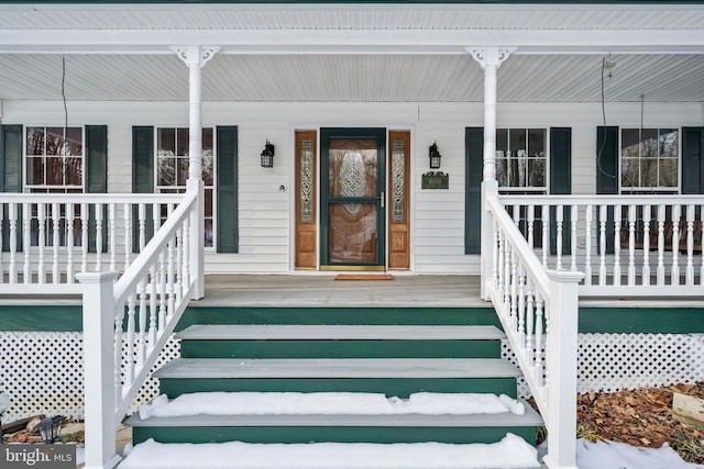 entrance to property with covered porch