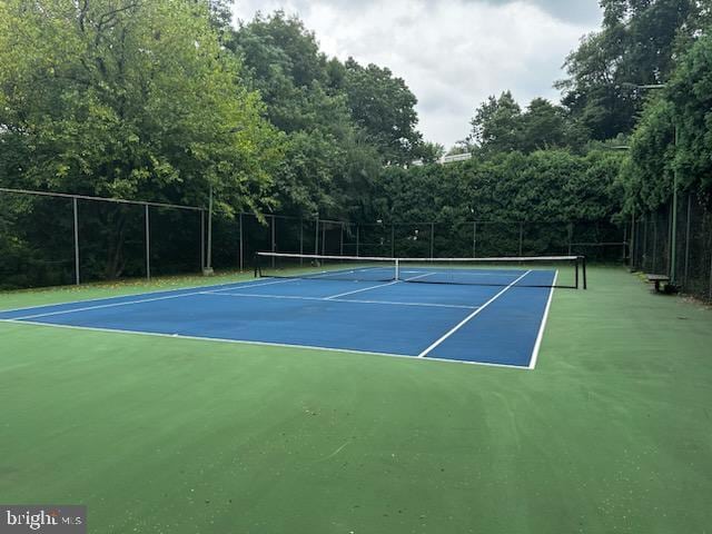 view of tennis court with basketball court