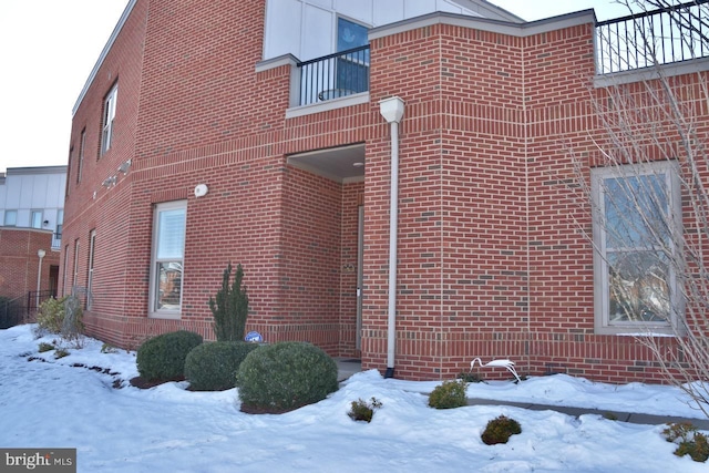 view of snow covered property