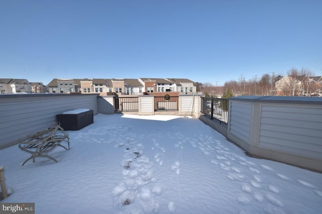 view of yard covered in snow