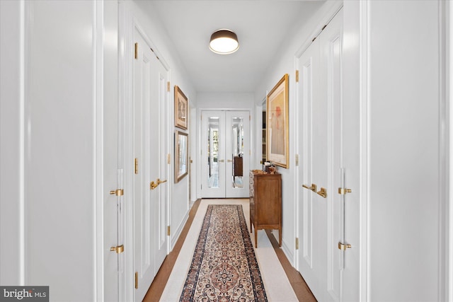 corridor featuring french doors