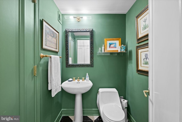 bathroom with sink and toilet