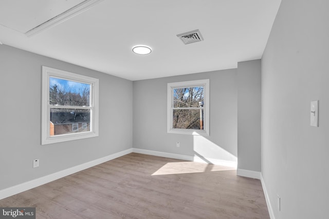 empty room featuring light hardwood / wood-style floors