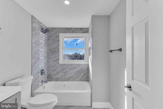 full bathroom with vanity, toilet, and tiled shower / bath combo