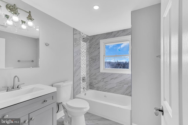 full bathroom with tiled shower / bath combo, vanity, and toilet