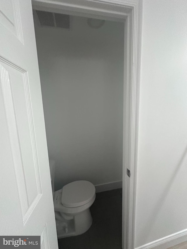 bathroom featuring toilet