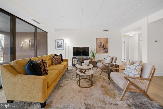 living room featuring light wood-type flooring