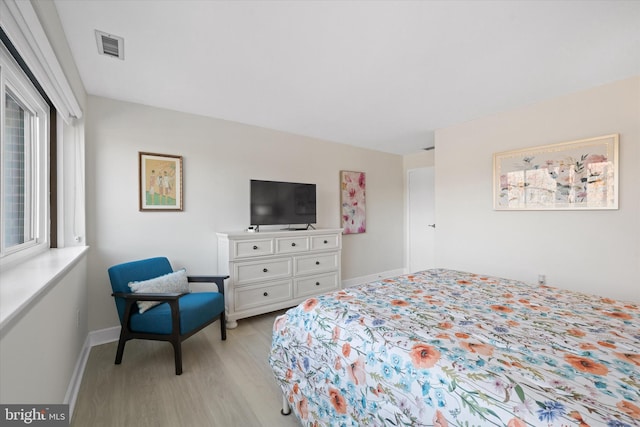 bedroom featuring light wood-type flooring