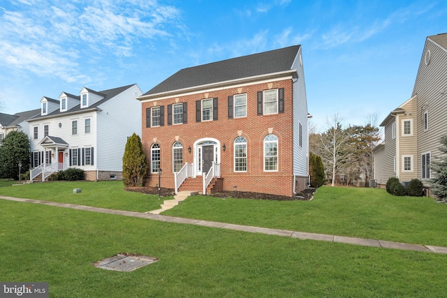 colonial home with a front yard