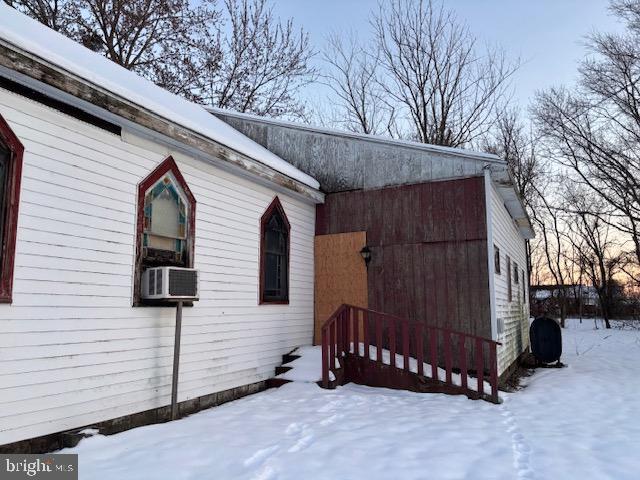 view of snow covered property