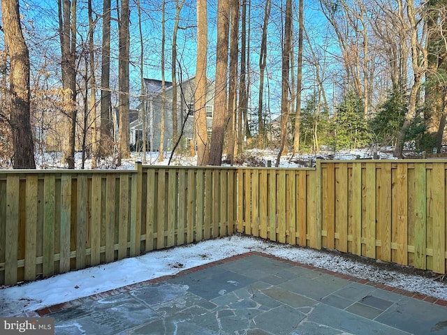 view of snow covered patio