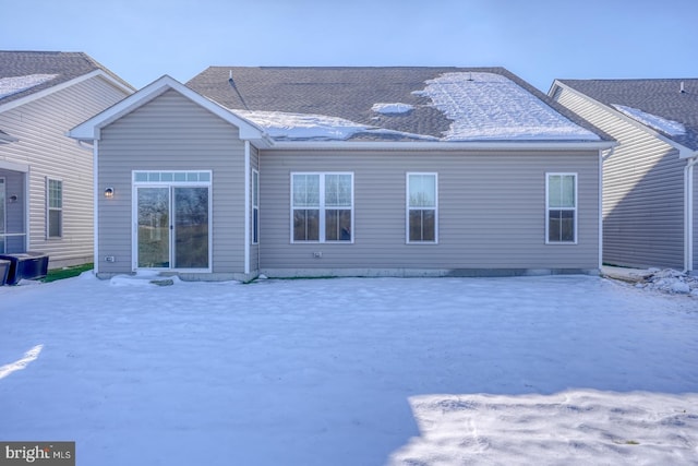 view of snow covered house