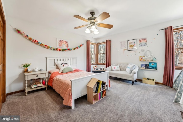 carpeted bedroom with ceiling fan