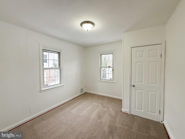 empty room with carpet floors