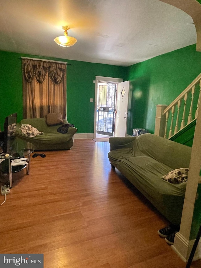 interior space with access to outside and light hardwood / wood-style floors