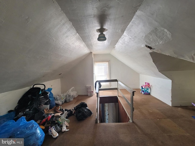 bonus room featuring lofted ceiling