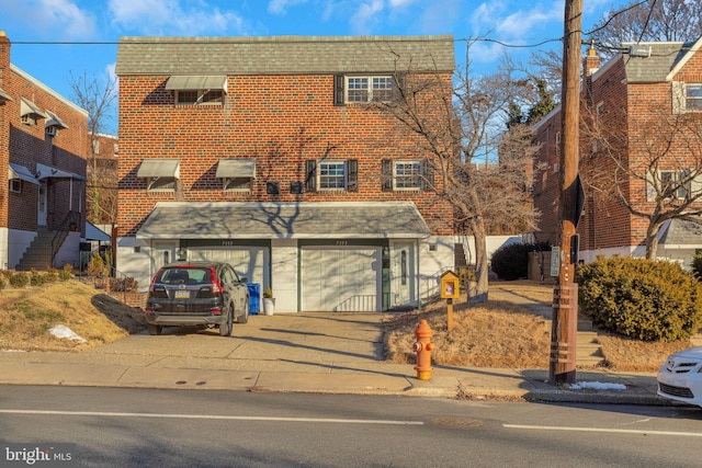 front facade with a garage