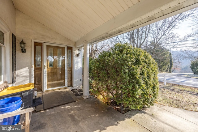 entrance to property featuring a patio area