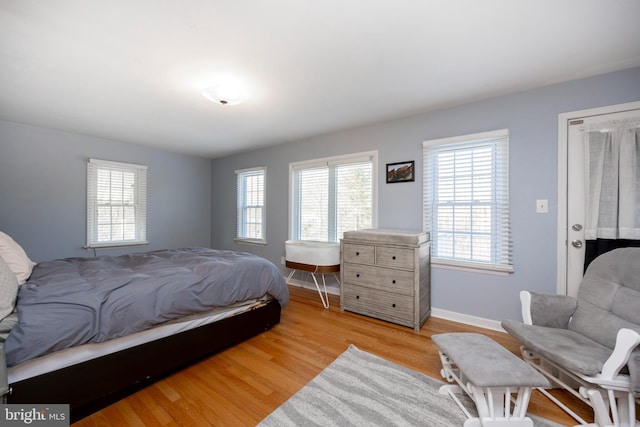 bedroom with light hardwood / wood-style flooring