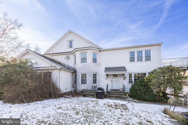 view of snow covered property