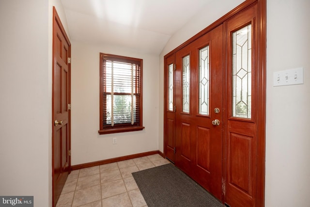 entryway featuring lofted ceiling