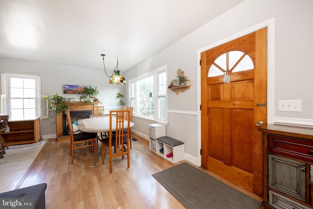 dining space with light hardwood / wood-style flooring