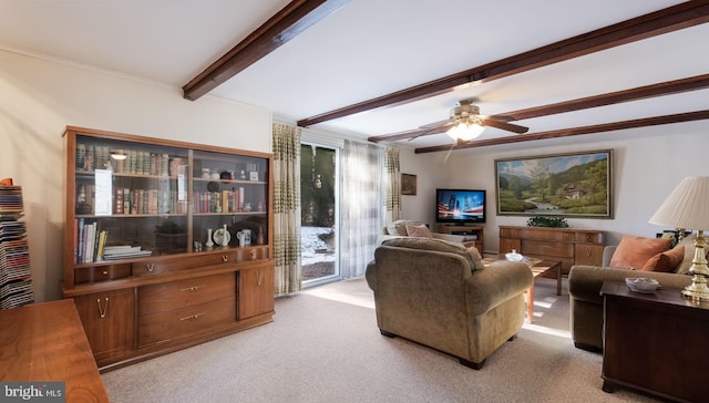 living room with light colored carpet, ceiling fan, and beam ceiling