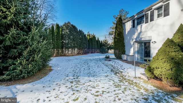 view of snowy yard