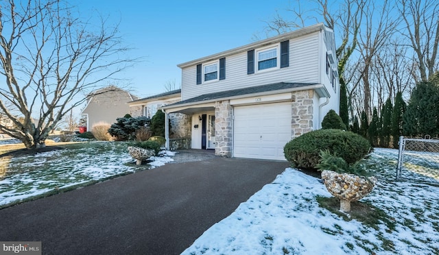 front of property with a garage