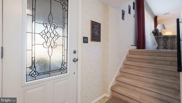 foyer featuring a wealth of natural light