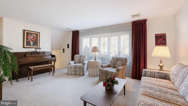 sitting room with light colored carpet