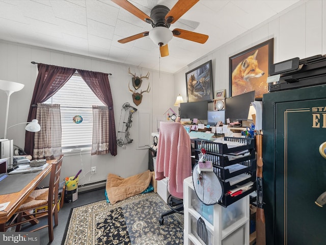 office area featuring ceiling fan and baseboard heating