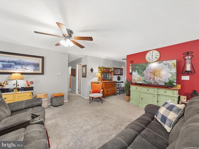 living room with light carpet and ceiling fan