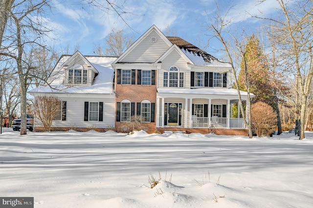 view of front of property featuring covered porch