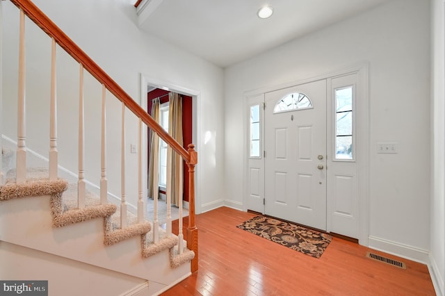 foyer with hardwood / wood-style floors