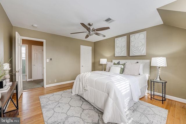 bedroom featuring light hardwood / wood-style floors and ceiling fan