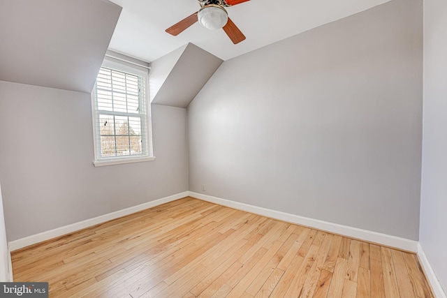 bonus room with lofted ceiling, light hardwood / wood-style flooring, and ceiling fan