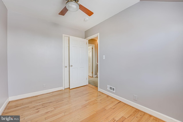 unfurnished room featuring ceiling fan and light hardwood / wood-style flooring