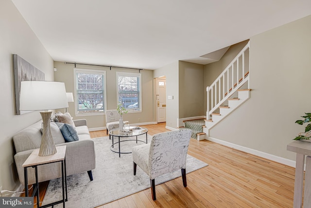 living room with light hardwood / wood-style floors