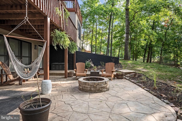 view of patio / terrace featuring a fire pit