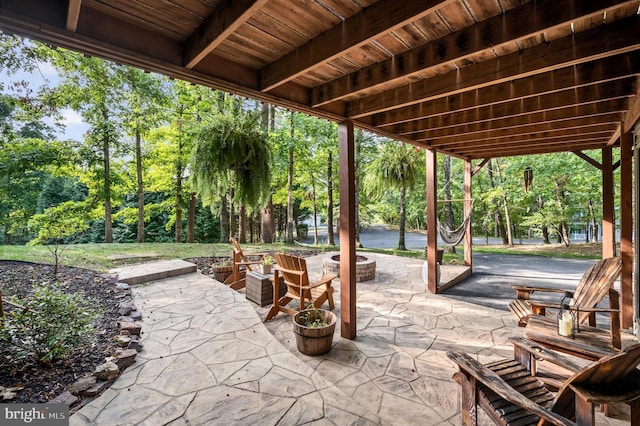 view of patio / terrace with a fire pit